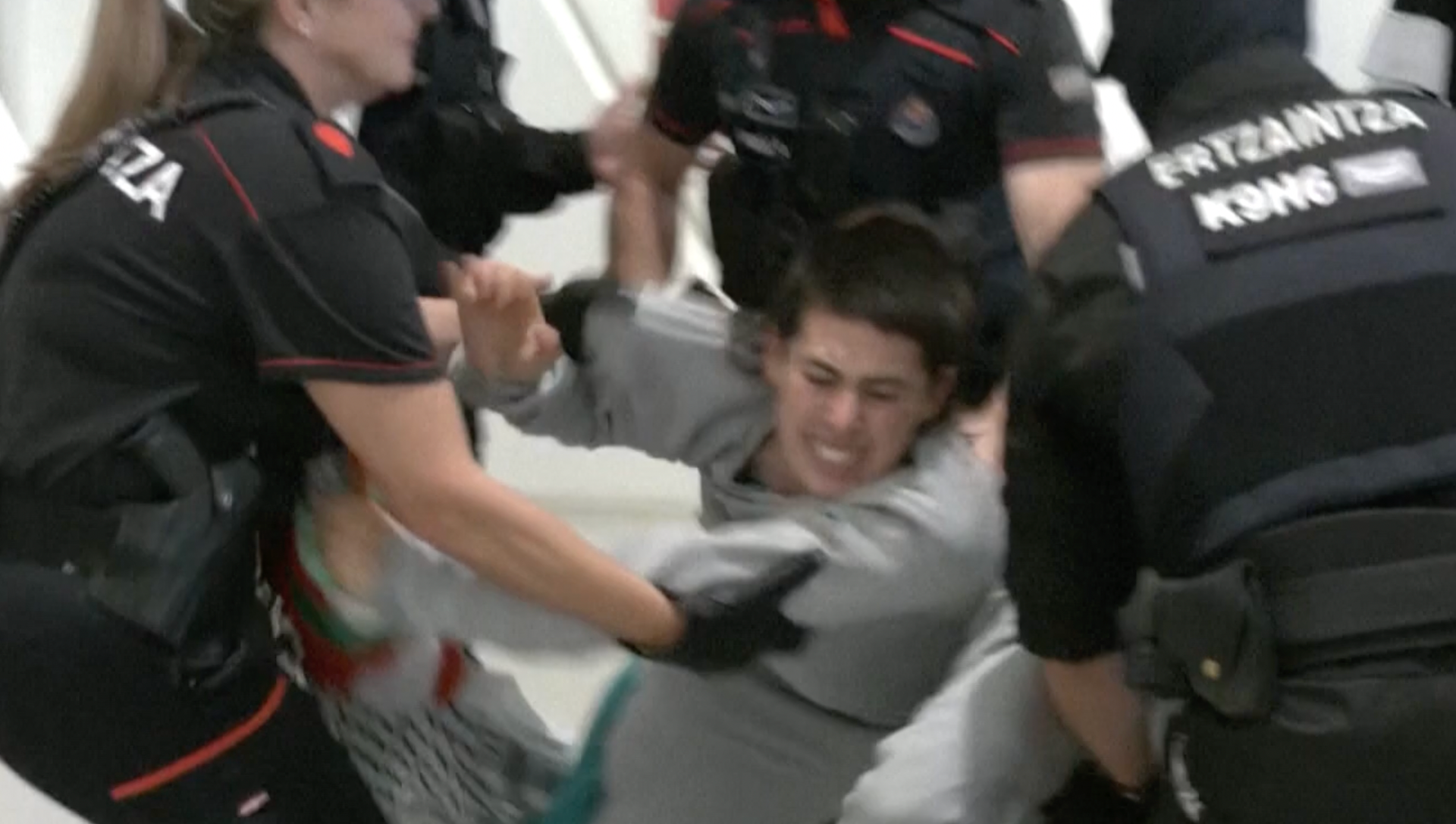 Spanish police beat and detain Gaza flotilla activists at airport