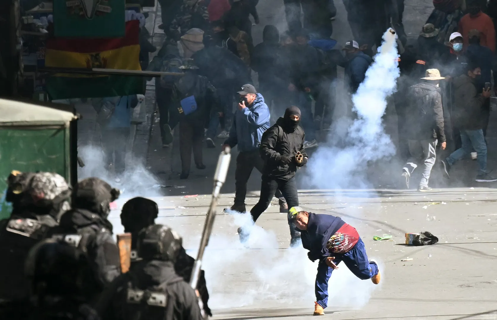 Tensions rise in Bolivia as protesters march toward presidential palace