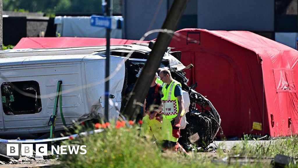 Several killed as train and school bus collide in Belgium, local media report