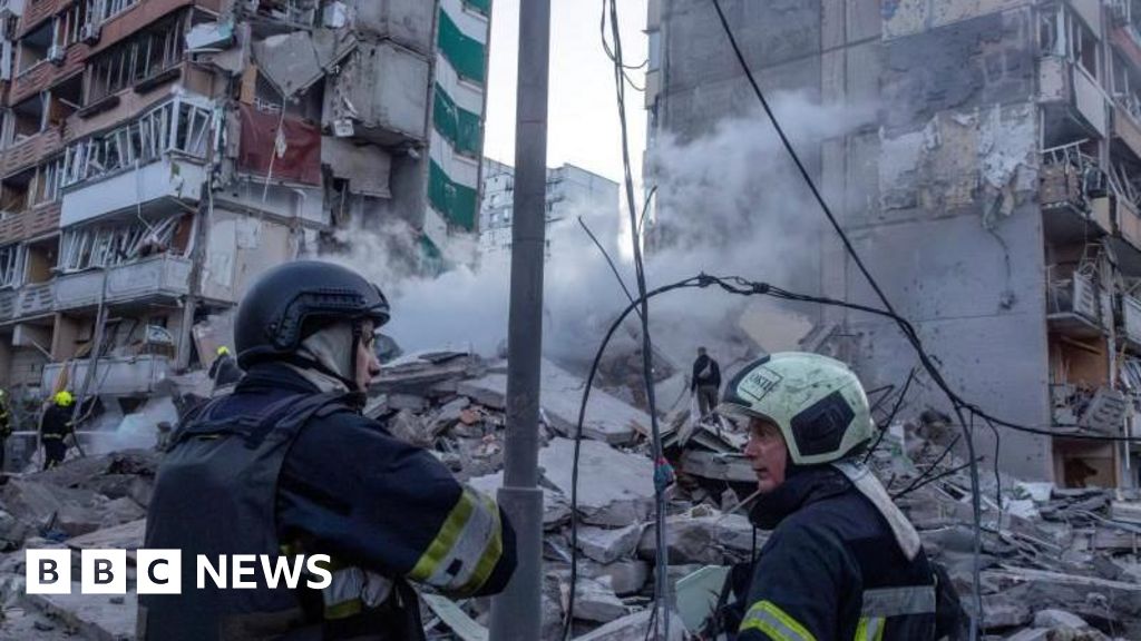 Ukraine rescuers pull dead from rubble of Kyiv flats after massive Russian strikes
