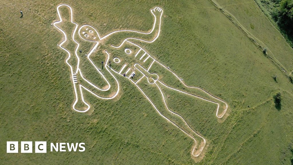 UK's rudest chalk figure gets a glow-up to stop it fading in the rain