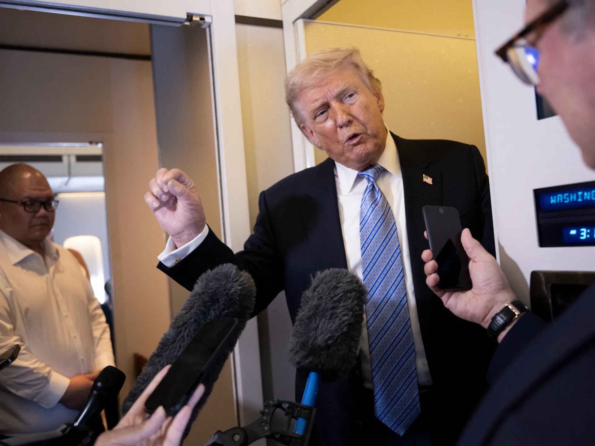 Trump departs China touting deals, but little clarity on Iran or Taiwan