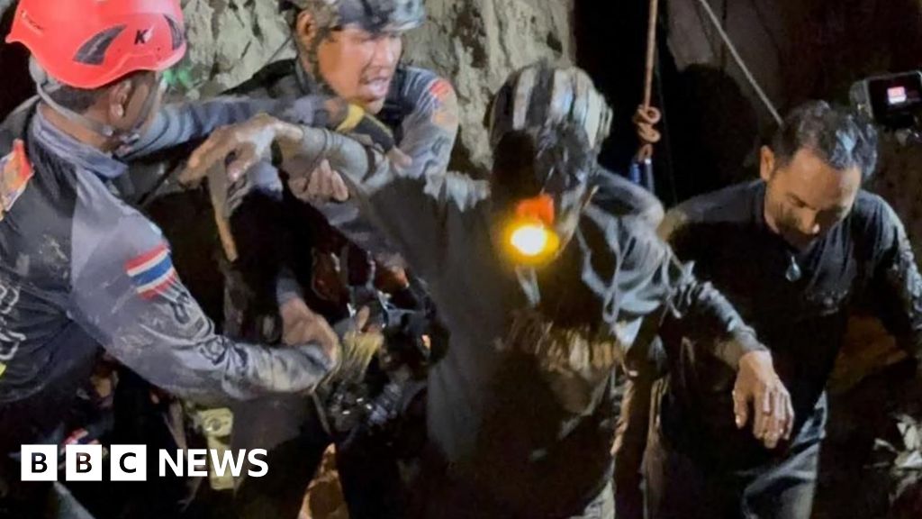 First of five men found alive in flooded Laos cave rescued