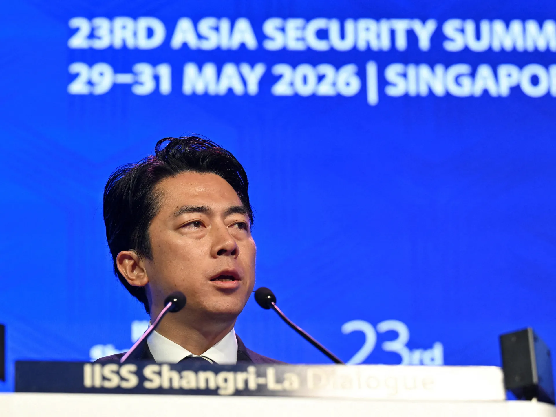 Japan rejects ‘new militarism’, says China is rapidly arming
