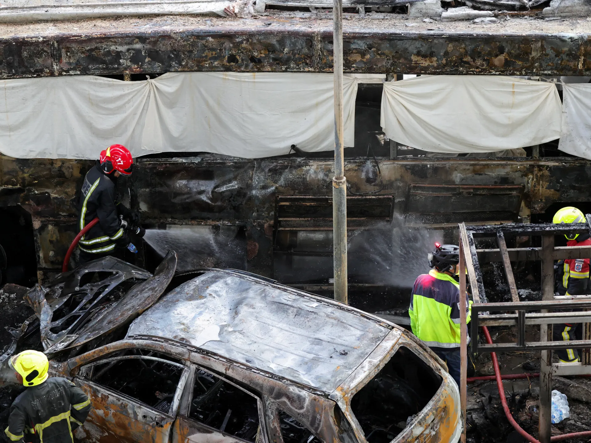 At least eight killed, 25 injured as train hits bus in Bangkok